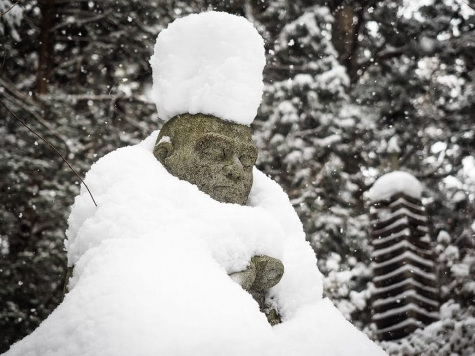 Snow topped Buddha in Okunoin cemetery, Koyasan