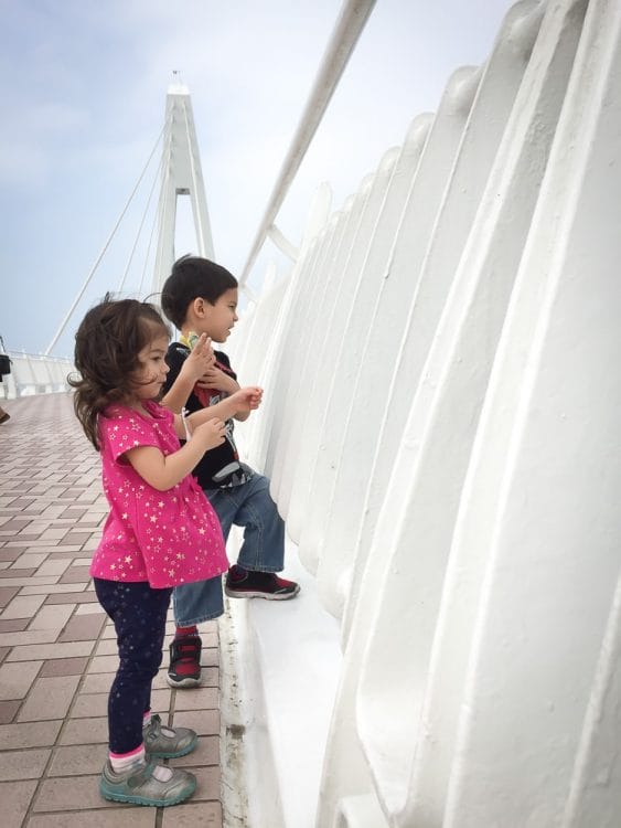 My kids on Lover's bridge, Fisherman's Wharf, Taipei