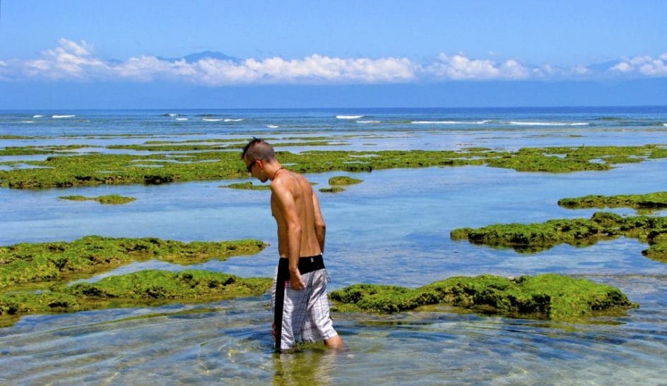Me walking in some coastal pools of water at Green Islands, Taiwan in summer