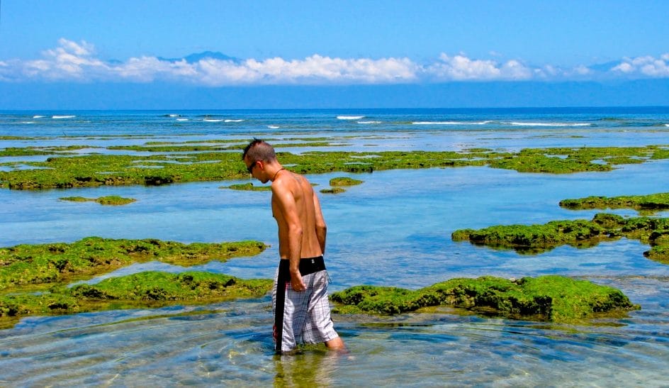 Me walking in some coastal pools of water at Green Islands, Taiwan in summer