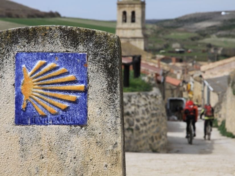 Pilgrim travelers walking along the famed Camino de Santiago