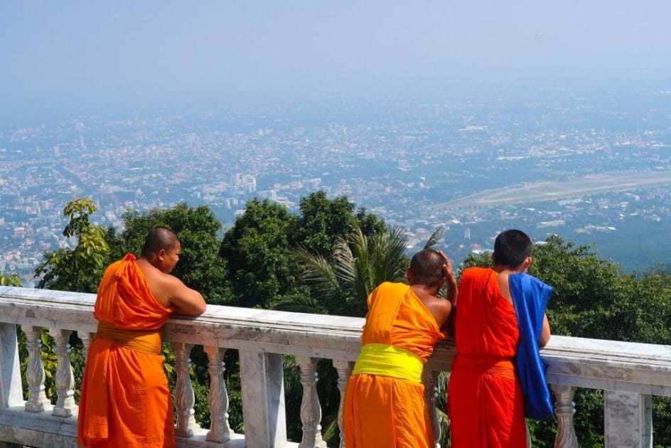 Monks looking down on Chiang Mai from Doi Suthep Temple