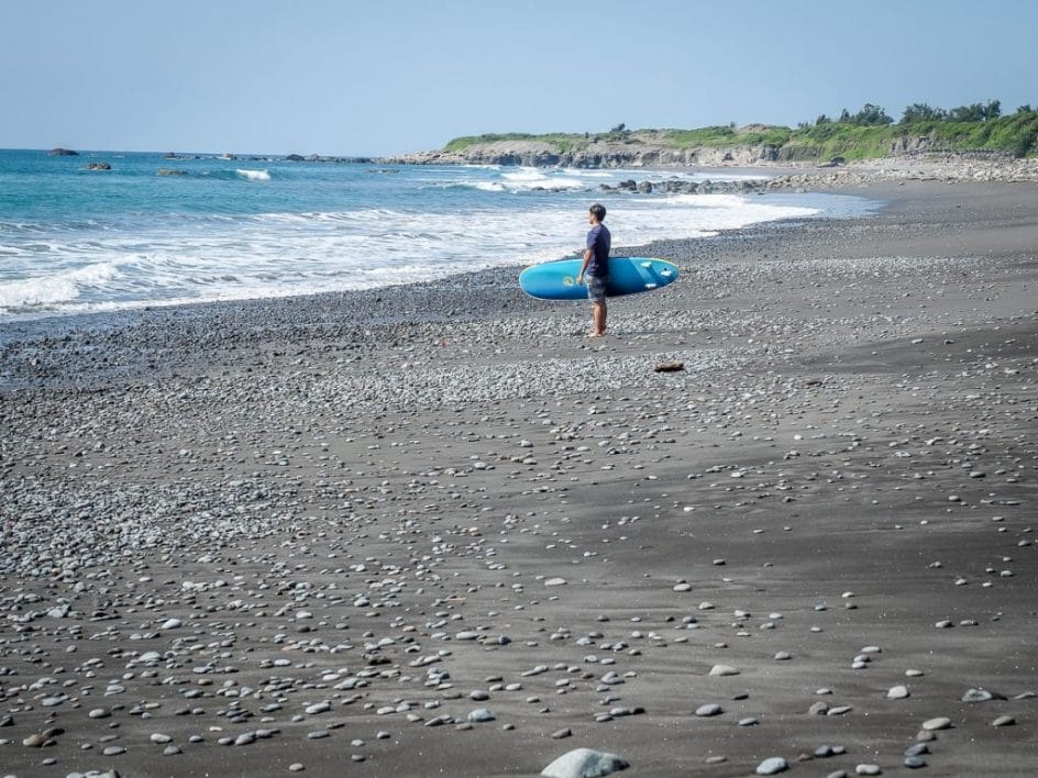 A surfer on Dulan beach in Taitung in winter
