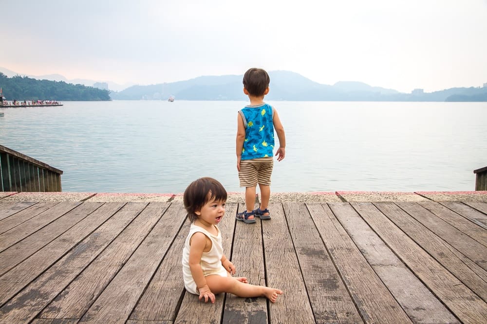 Playing on the docks at Itathao, Sun Moon Lake