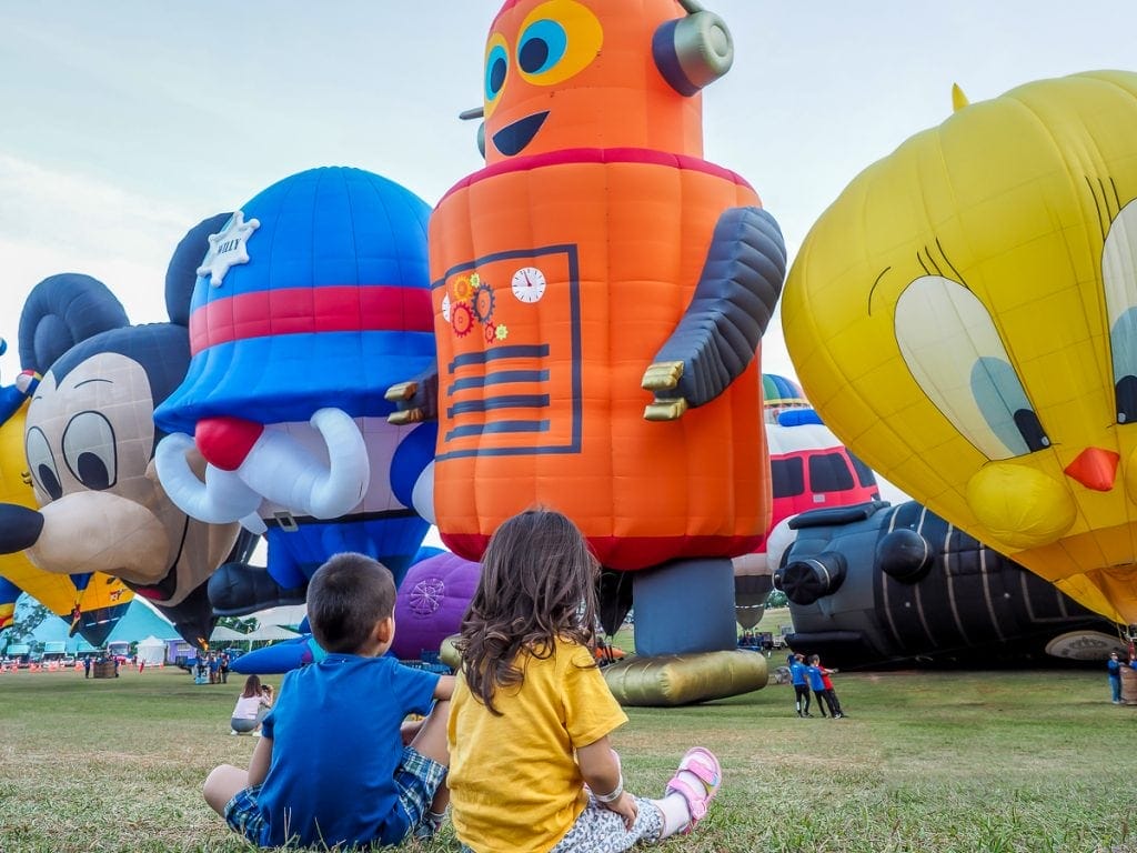 My kids watching the awesome display of hot air balloons, Luye highland, Taitung