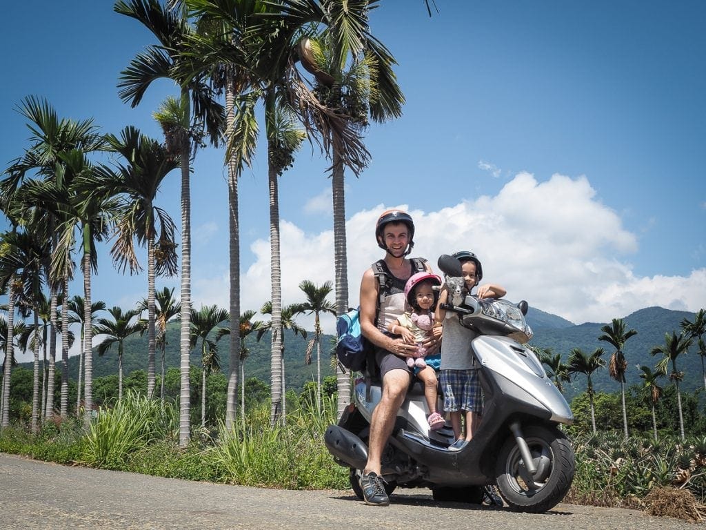 Me on a scooter with my two kids enjoy one of the best months to visit Taiwan