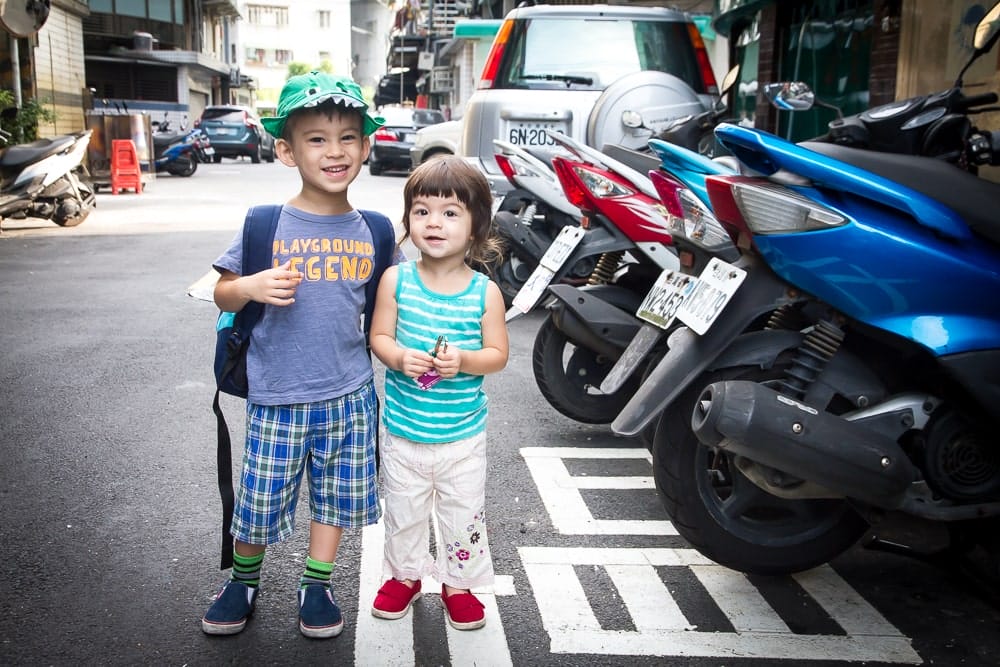 My kids Sage and Lavender in front of our home in New Taipei, Taiwan