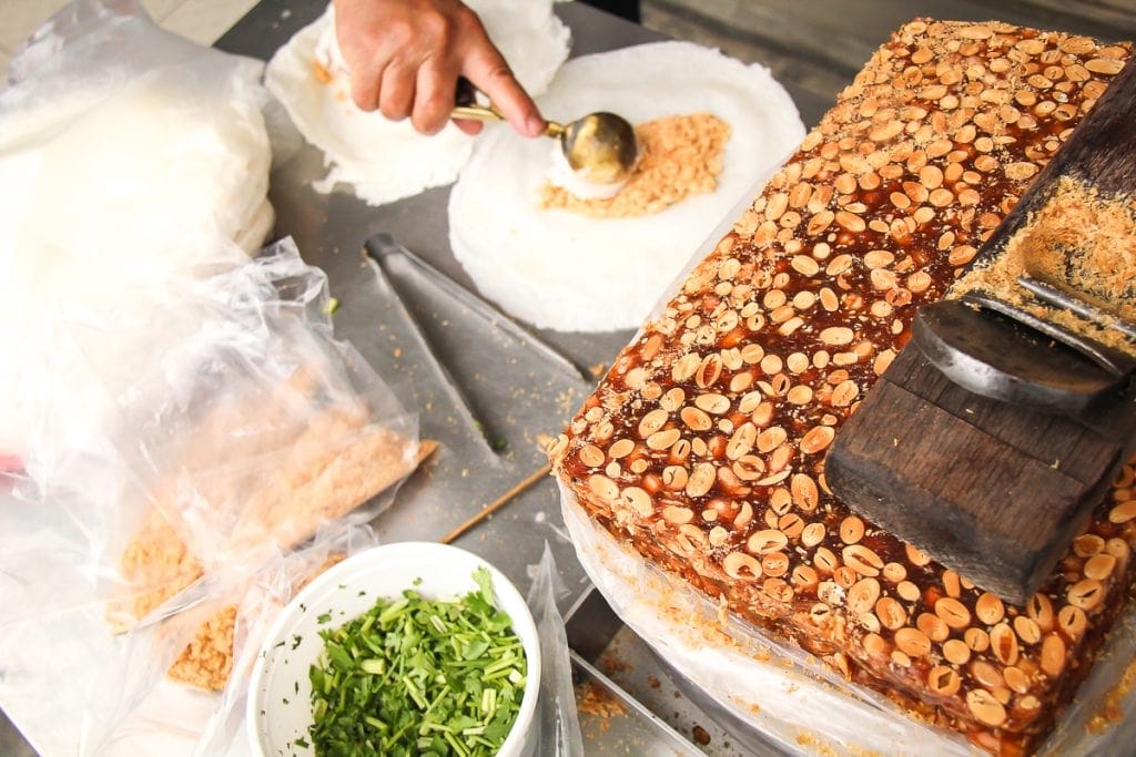 Peanut brittle ice cream wraps with cilantry, a common Taiwanese night market snack