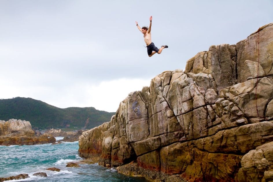 My friend cliff diving at Longdong, one of the best Taiwan summer activities