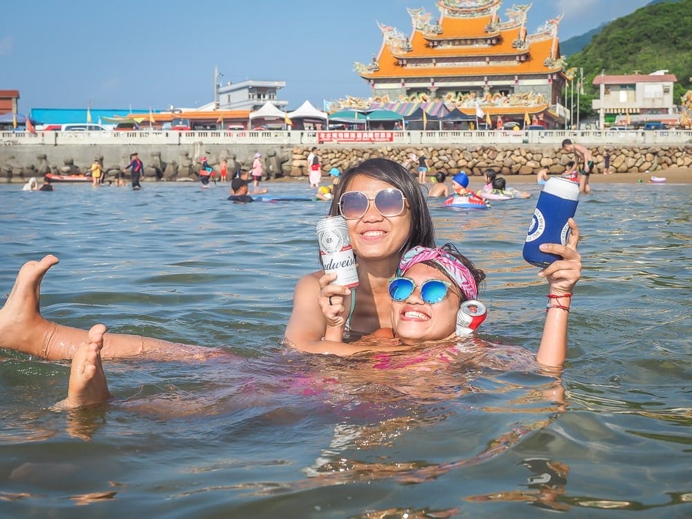 My friends on Fulong Beach Taiwan in summer