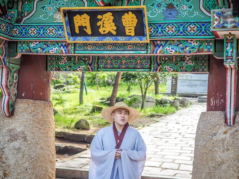 A monk at Beomeosa introducing the temple gate to use as part of the temple tour