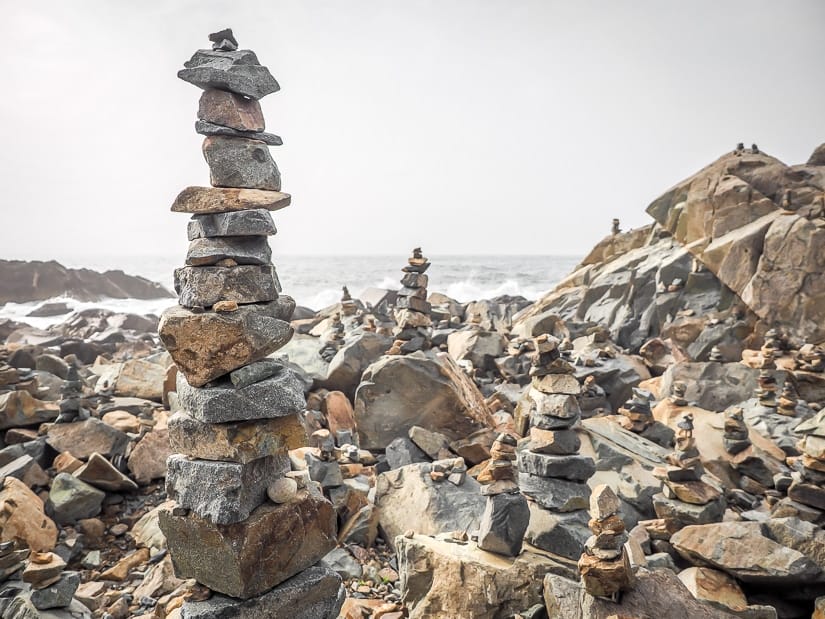 Rock people on coast near Haedong Yonggungsa