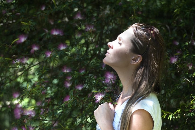 A woman staying in the present moment while traveling