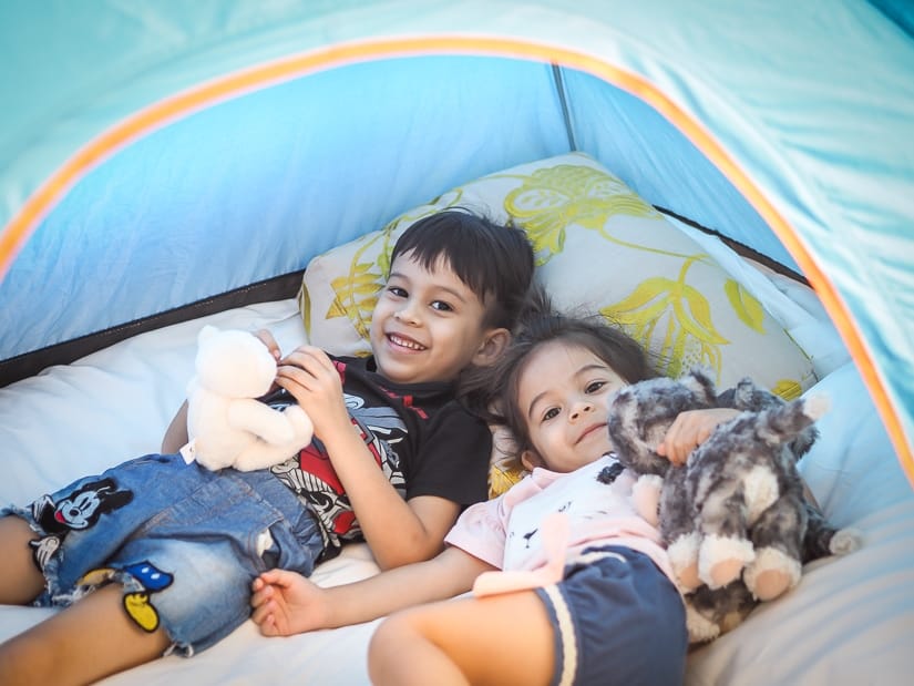 Kids in tent at Grand Hyatt luxury camping experience