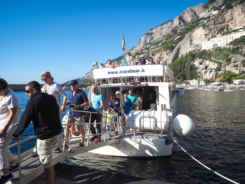 A ferry stopping at an Amalfi Coast town