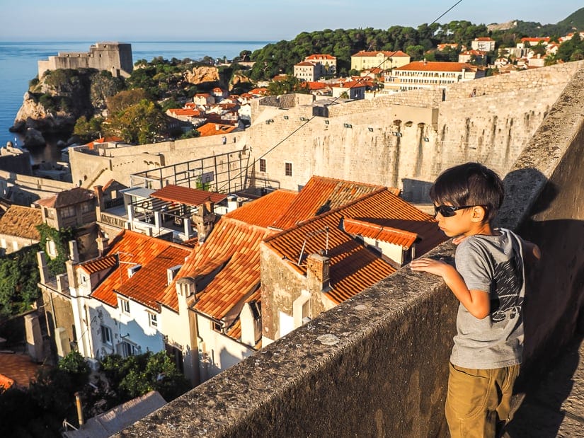 My son looking at Dubrovnik's rooftops from the norther section of the Old Town wall