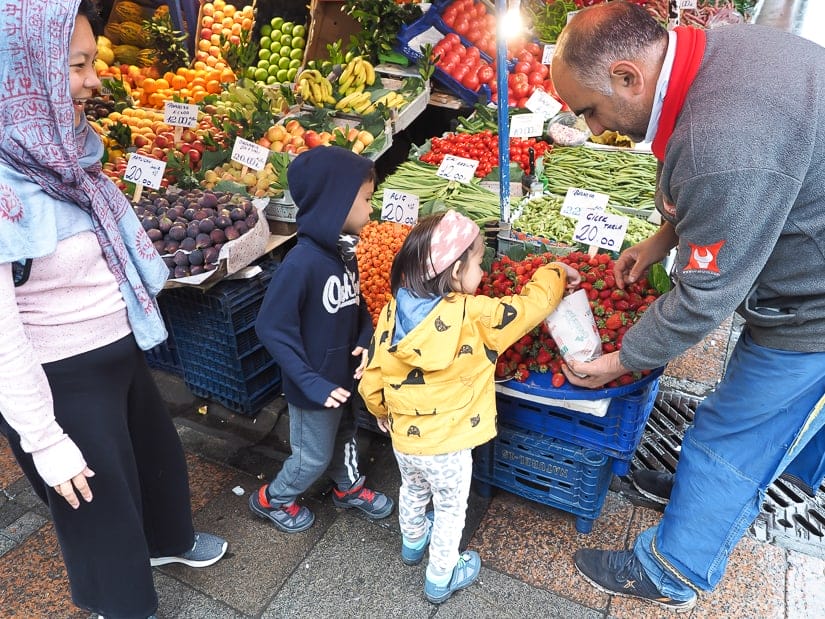 Visiting Kadikoy produce market with kids on the Asian side of Istanbul