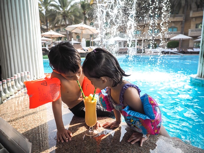 Our kids at the swim-up bar at the Grand Hyatt Muscat
