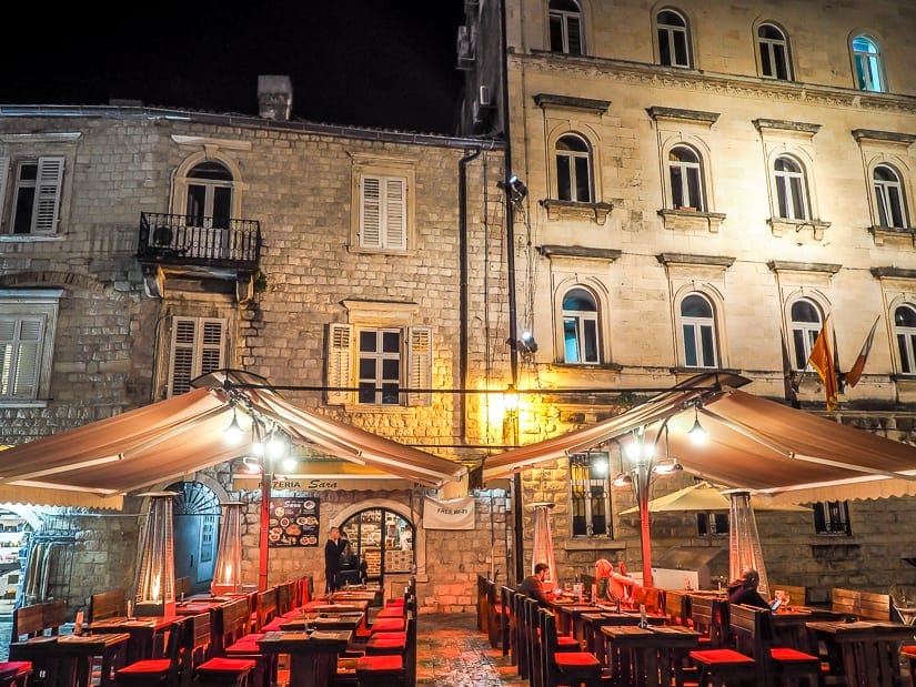 A restaurant patio in Kotor at night