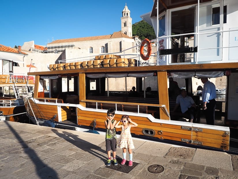 Our kids in front of the ferry to Lokrum Island in Dubrovnik