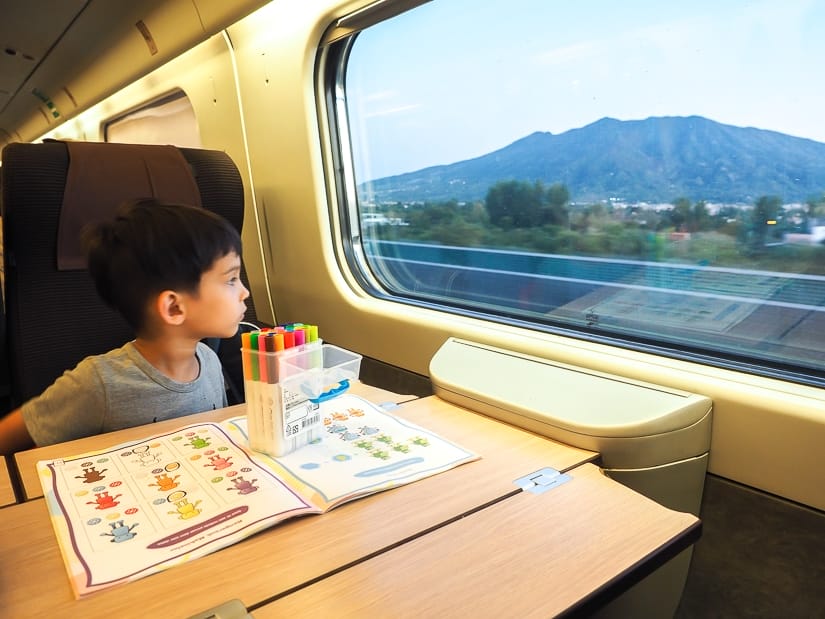 My son seeing the view of Mt. Vesuvius from the high speed train