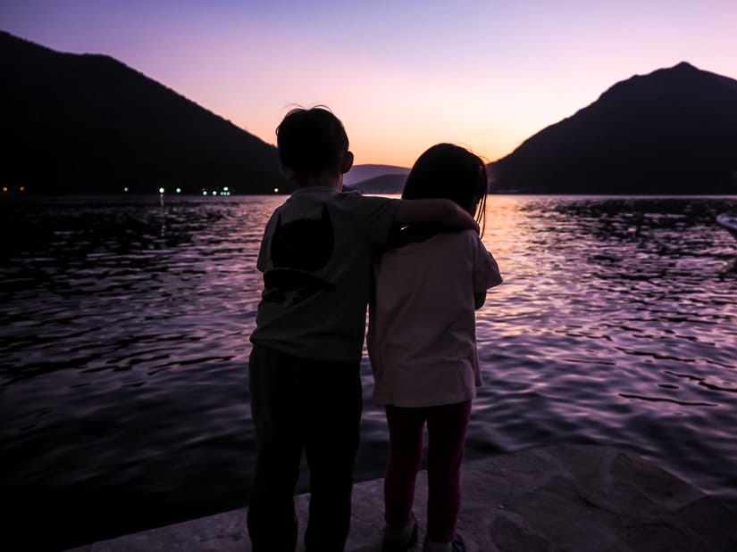 Our kids watching the sunset in Perast, Montenegro