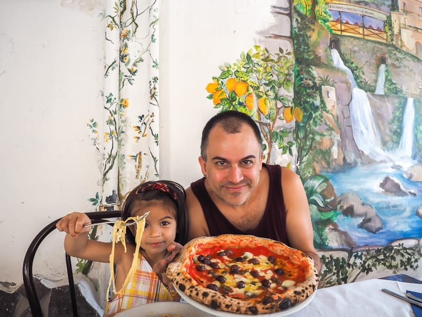 Me and my daughter eating pizza and pasta in Amalfi coast