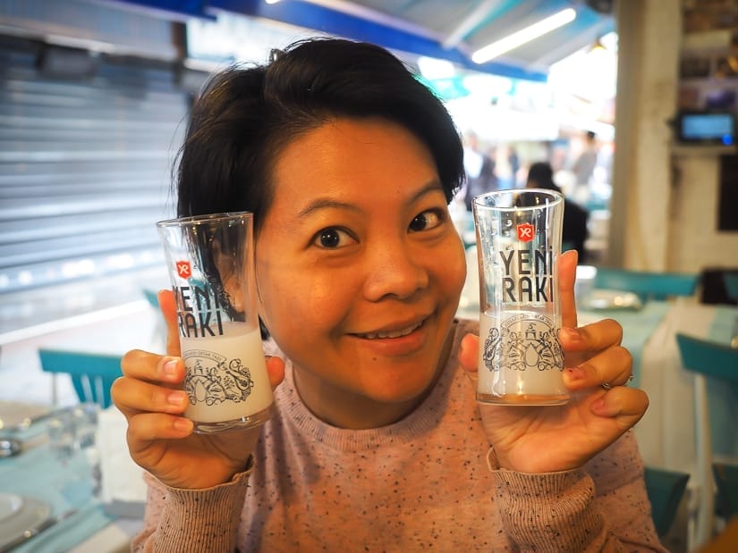 Emily having raki in a seafood restaurant in Kadikoy