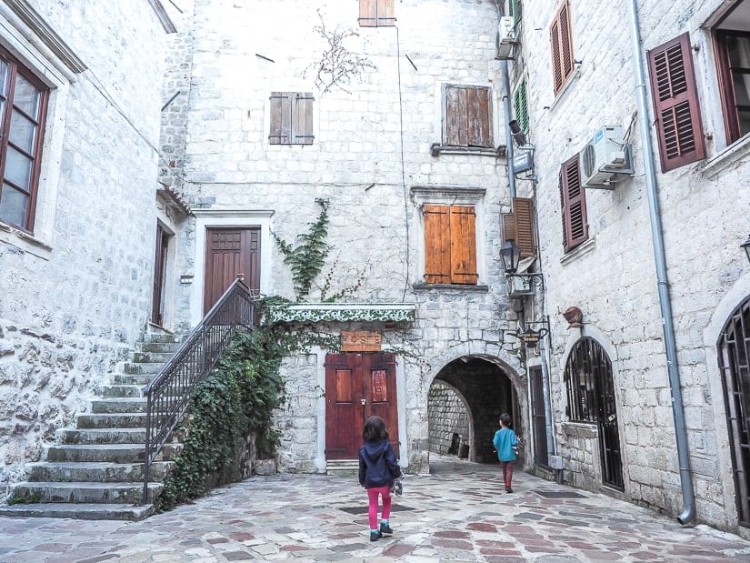 My kids in an empty square in Kotor Old Town