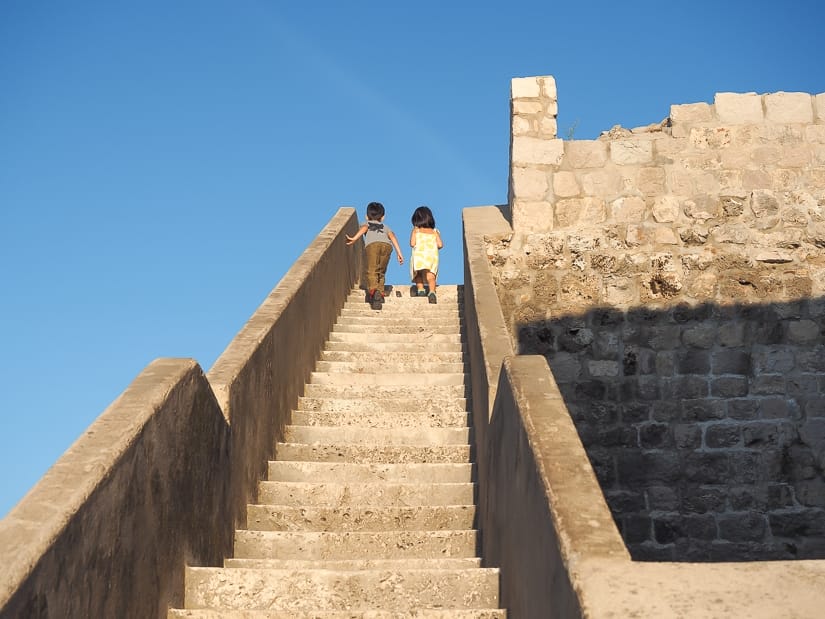 Our kids climbing up the walls around Dubrovnik