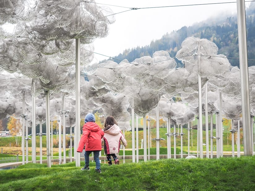 Our kids walking under clouds of crystals at Swarovski Kristallwelten