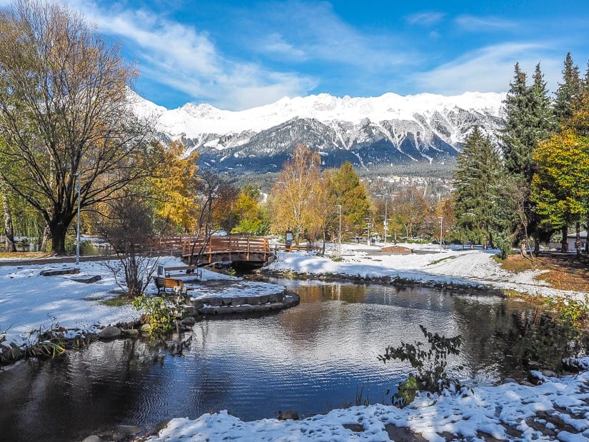 A pretty park in Innsbruck with mountains in the background, a good family-friendly thing to do in Innsbruck