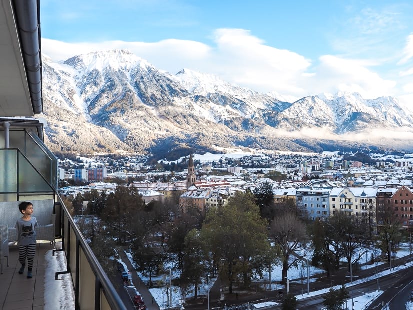 My son on our apartment balcony overlooking Innsbruck