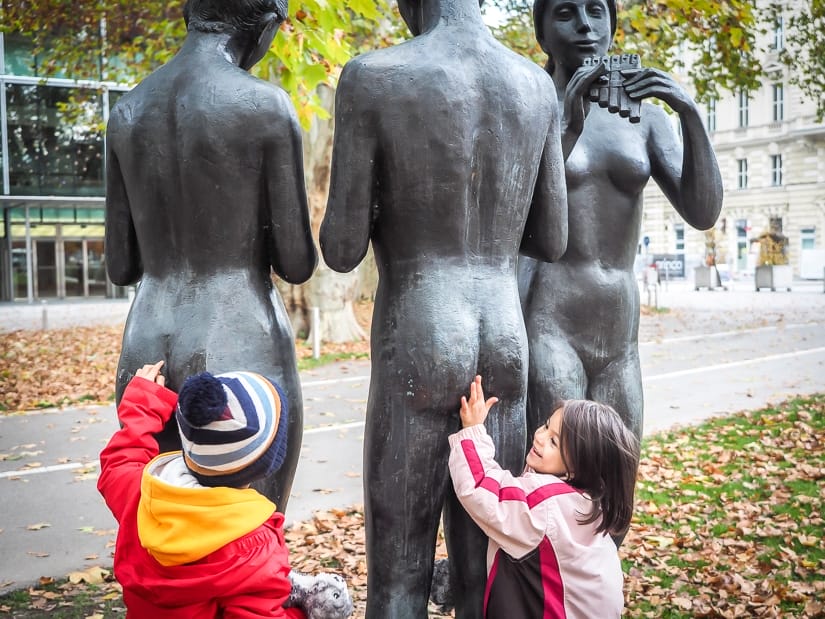 My kids touching the butts of some nude statues in at Mirabell Palace gardens