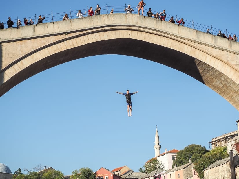 A Stari Most bridge diver falling from the bridge