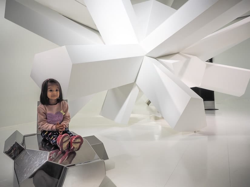 My daughter in a crystal themed 3D-printing exhibit at Swarovski Kristallwelten