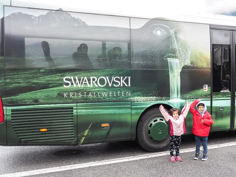 Our kids in front of the Swarovski Kristallwelten shuttle bus