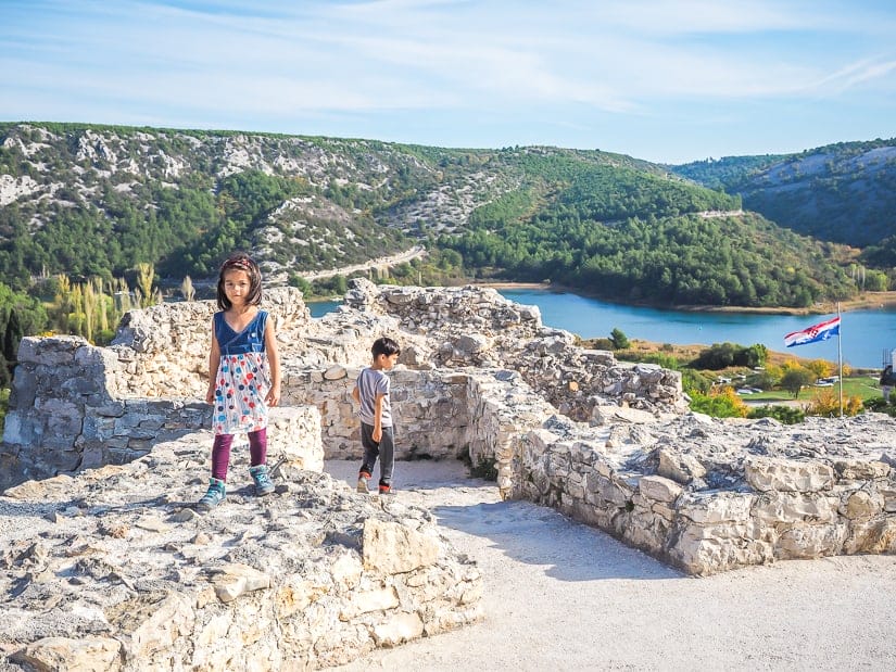 Two kids exploring Turnian Fortress (Skradin Fortress)