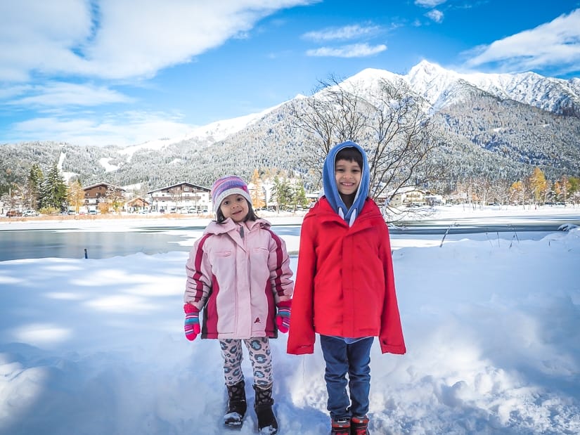 Our kids in front of Wildsee, a lake in Seefeld, when it was covered in snow and ice