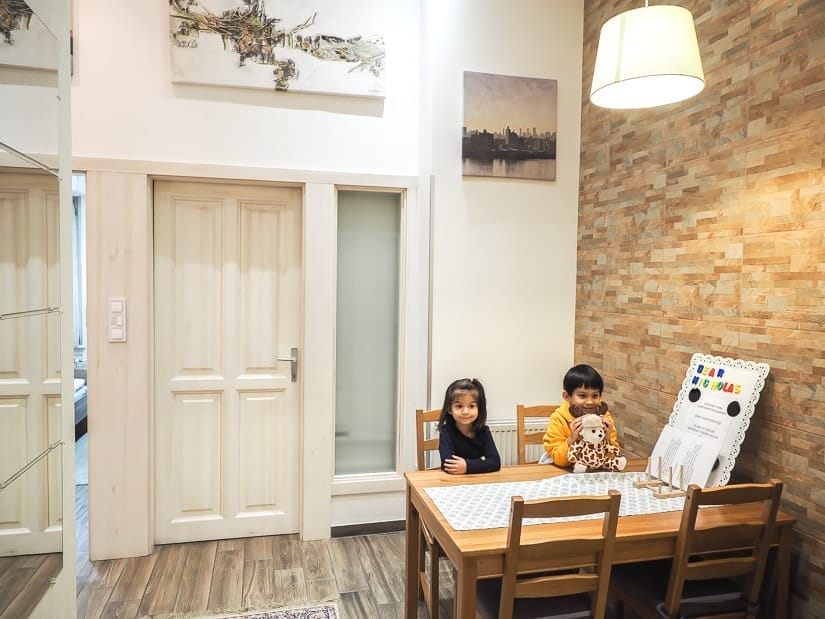 Our kids inside our family-friendly apartment in Budapest