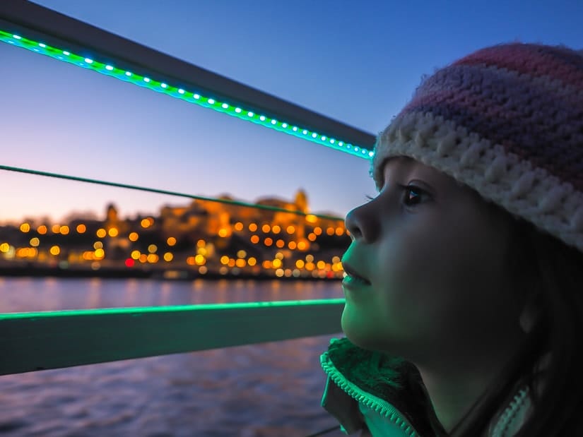 My daughter viewing Budapest from our river cruise just after sunset