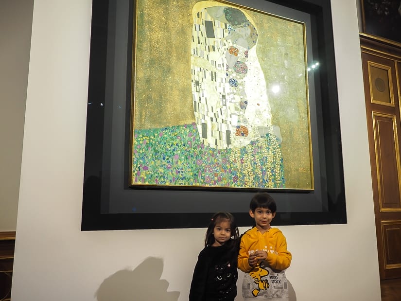Our kids standing in front of "The Kiss", a painting by Klimt, in the Belvedere Art Galley in Vienna