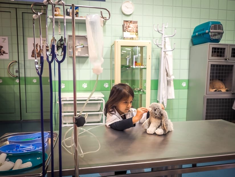 My daughter playing veterenarian at MiniPolisz Budapest