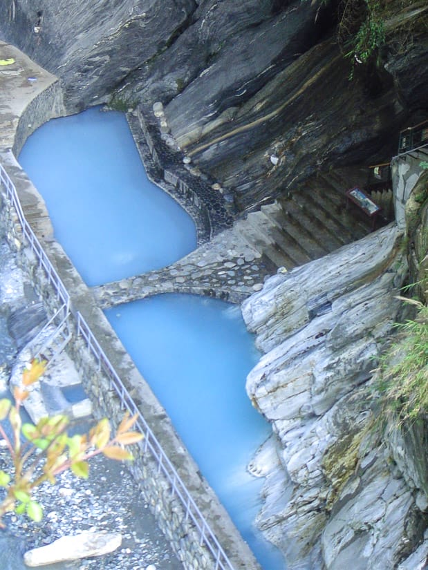 Two stone hot spring pools viewed from above