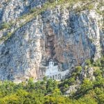 If you're looking to take an Ostrog Monastery tour or travel from Podgorica to Ostrog Monastery or Kotor to Ostrog Monastery, this article has all the details!