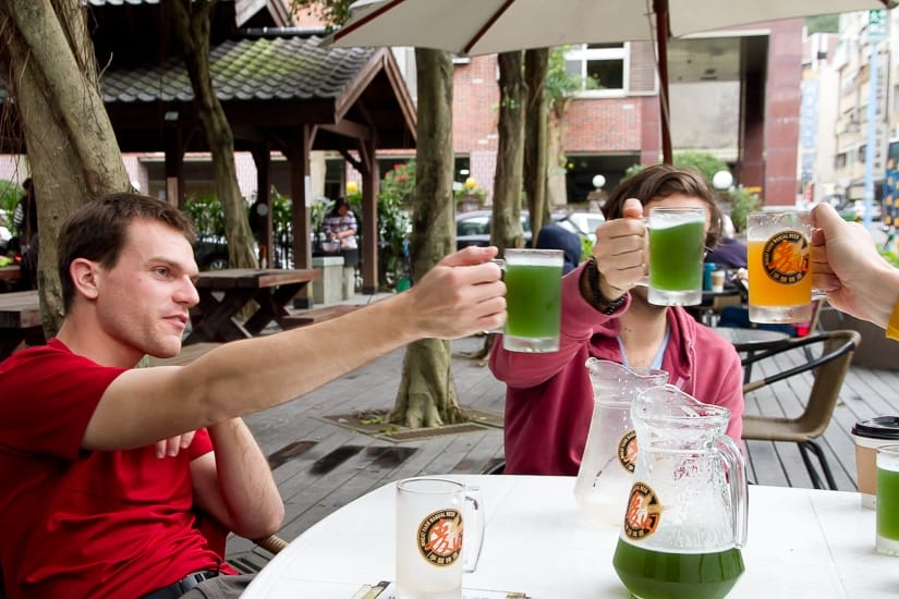 Our friends drinking green beer at Tangweigou hot spring park in Jiaoxi