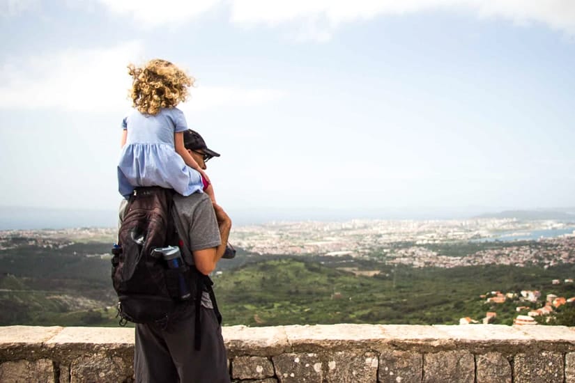 Looking down at the view from Klis fortress while visiting Split with children