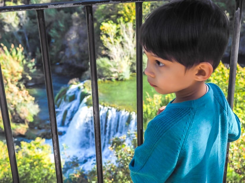 Overlooking a waterfall while visiting Krka National Park with children