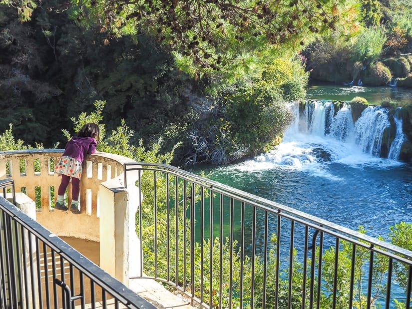 Visiting Krka with kids; here my daughter is overlooking one of the many waterfalls in the national park