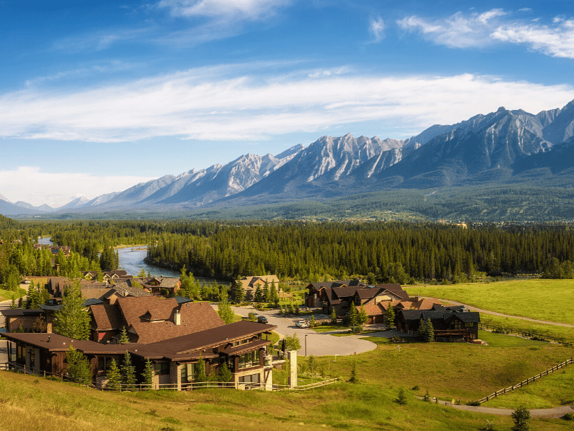 Canmore Nordic Centre in summer with mountains in background